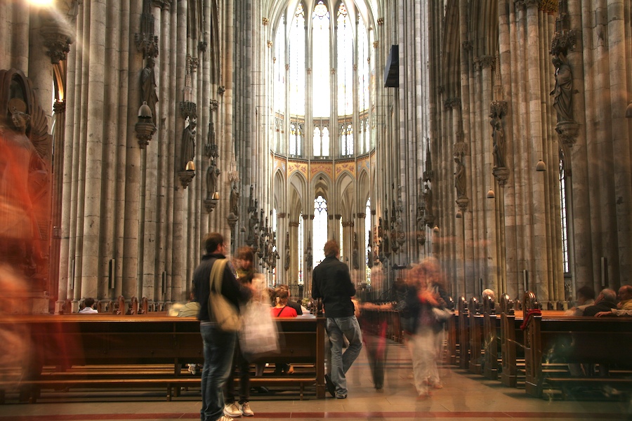 Time stands still for this admirer in the breathtaking Cathedral of Cologne.