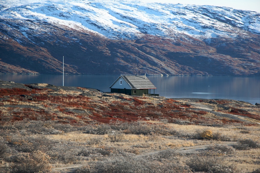 The hut overlooking the fjord near Kangerlussuaq suggests a peaceful solitude on an intrinsically beautiful and dynamic land that is rarely visited.